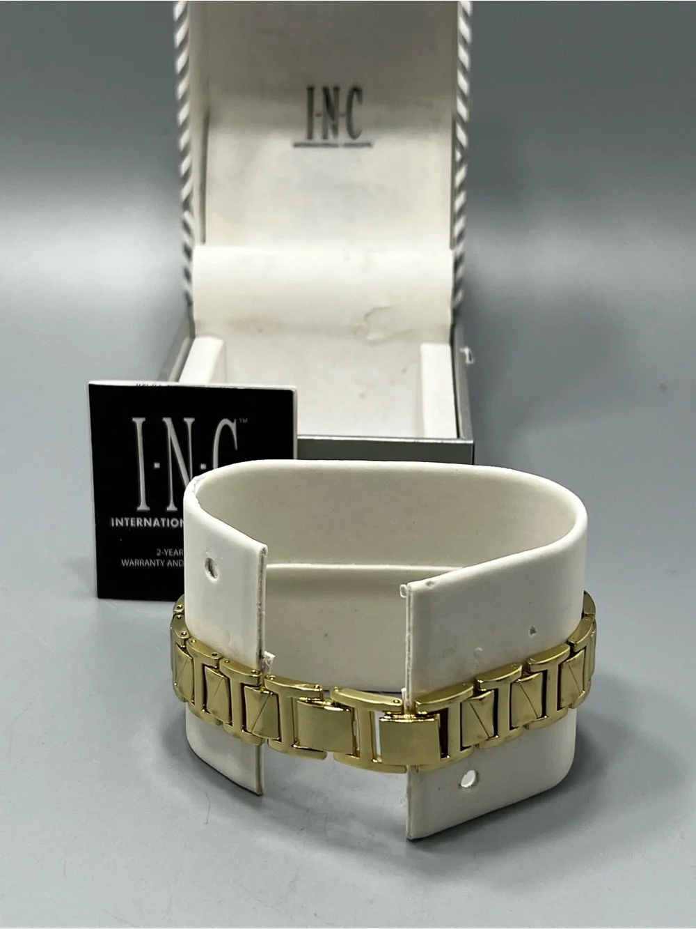INC International Concepts sleek gold